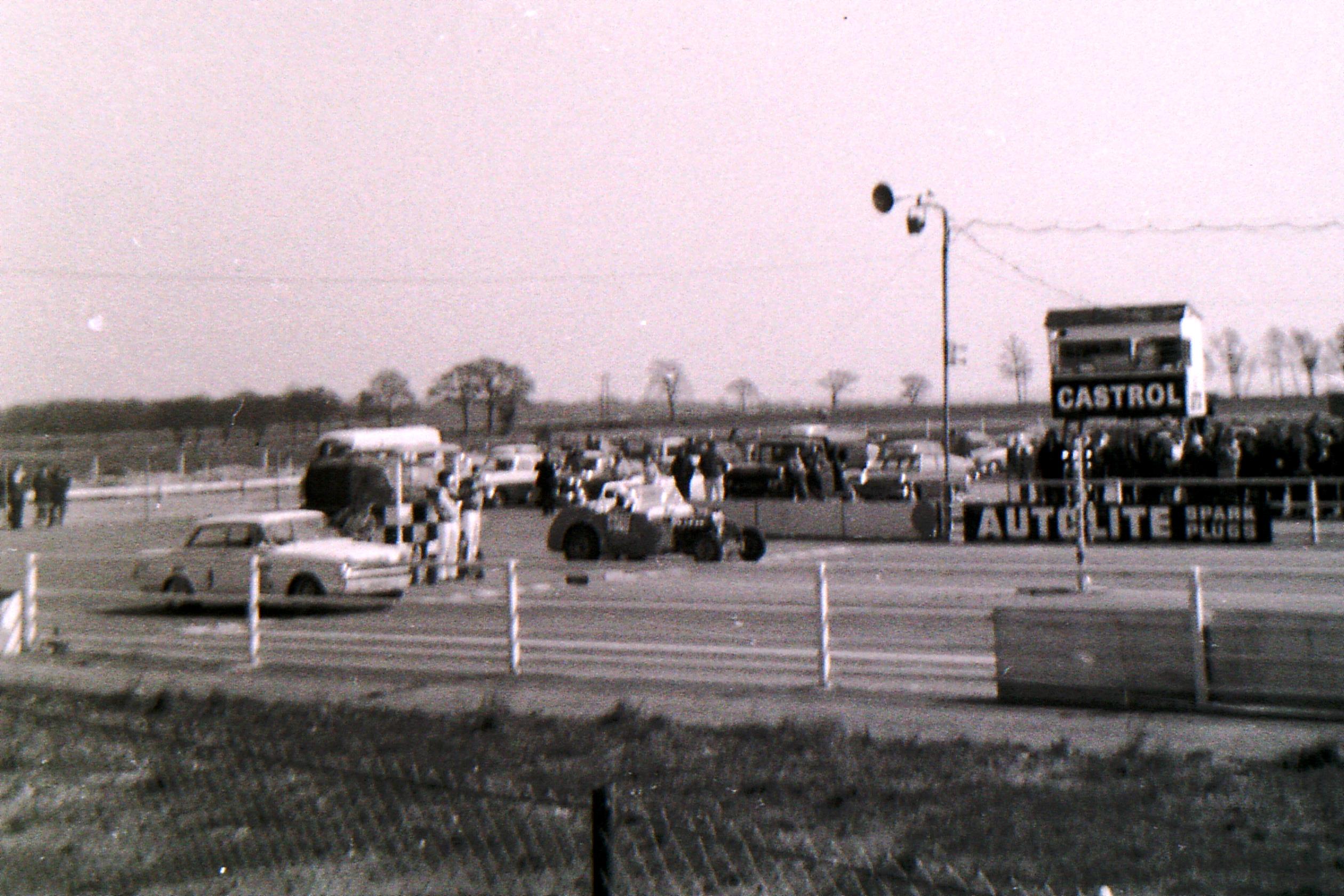 289 powered Cortina against Bill McGrath's Gloink Jag-powered Triumph Roadster